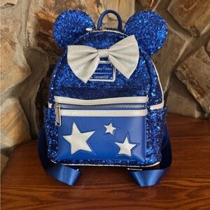 Sparkly Blue Disney Parks Loungefly Backpack with Stars and Bow